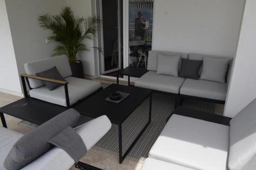 Posezení v ubytování Apartmani Frlan II.