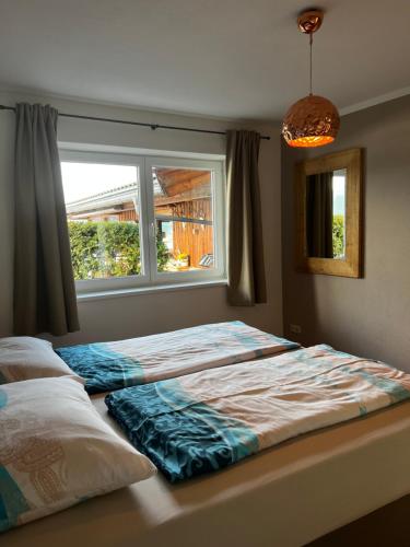 Posteľ alebo postele v izbe v ubytovaní Apartment Am Birkenweg
