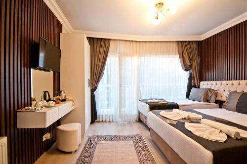 Katil atau katil-katil dalam bilik di Hotel Broken Column