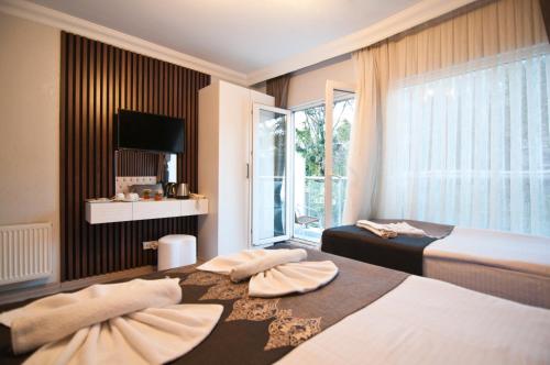 Katil atau katil-katil dalam bilik di Hotel Broken Column