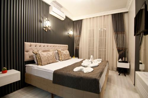Katil atau katil-katil dalam bilik di Hotel Broken Column