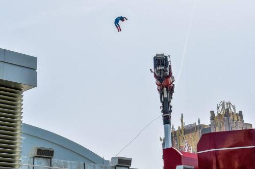 a person is flying in the air over a building at Hello Sunshine OC minutes to Disneyland-Family Friendly in Fullerton