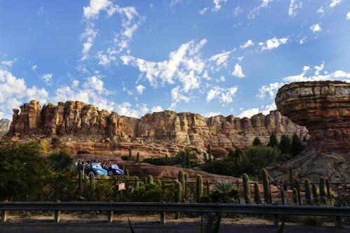 a group of people riding bikes in front of some rocks at Hello Sunshine OC minutes to Disneyland-Family Friendly in Fullerton