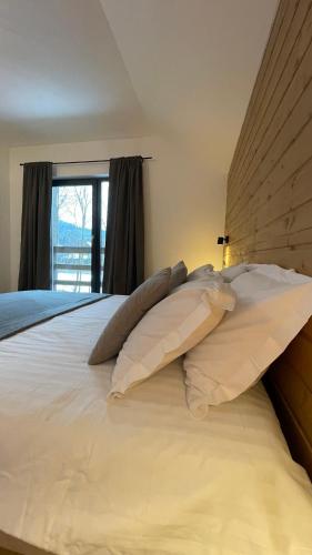 Una cama o camas en una habitación de A Sziget