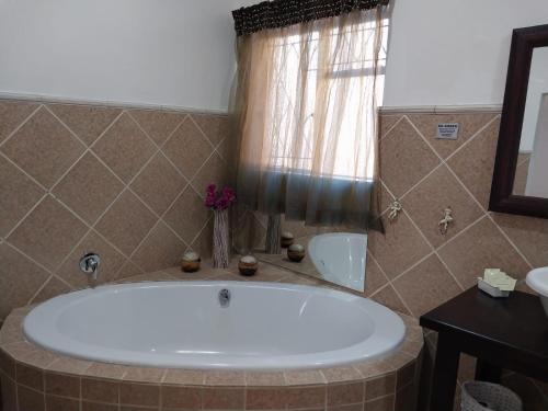 Ένα μπάνιο στο Sweet Dreams Guest House Schweizer Reneke