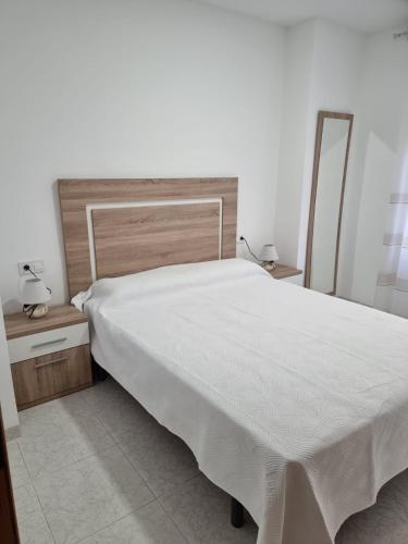 Postel nebo postele na pokoji v ubytování Cerca de la playa