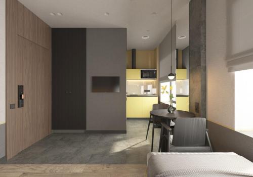 a kitchen and dining room with a table and chairs at FULL HOUSE apart hotel in Rivne