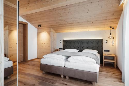 Ένα ή περισσότερα κρεβάτια σε δωμάτιο στο Residence Villa Trieste