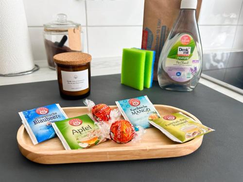 a cutting board with some food on a counter at Ferienwohnung Anton in Dessau