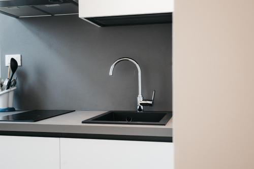 Kuchyň nebo kuchyňský kout v ubytování Winning Apartments