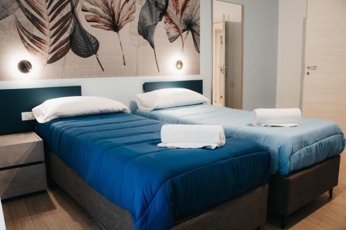 Postel nebo postele na pokoji v ubytování Winning Apartments