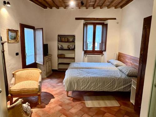Ένα ή περισσότερα κρεβάτια σε δωμάτιο στο Casa Monteloro