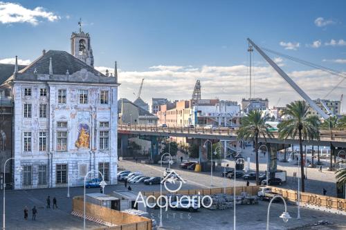 a building in a city with a crane at Acquario Suites in Genova