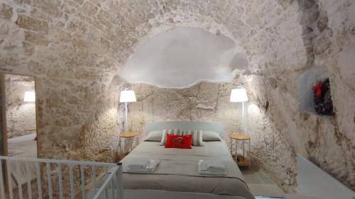 מיטה או מיטות בחדר ב-Cà Giò