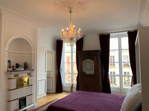 Photo de la galerie de l'établissement Appartement idéalement placé confortable et cosy à 800 m du Château, à Versailles