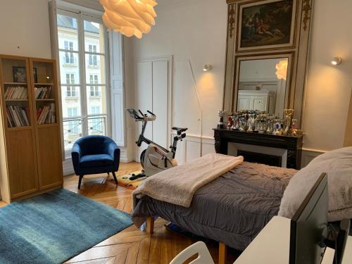 Photo de la galerie de l'établissement Appartement idéalement placé confortable et cosy à 800 m du Château, à Versailles