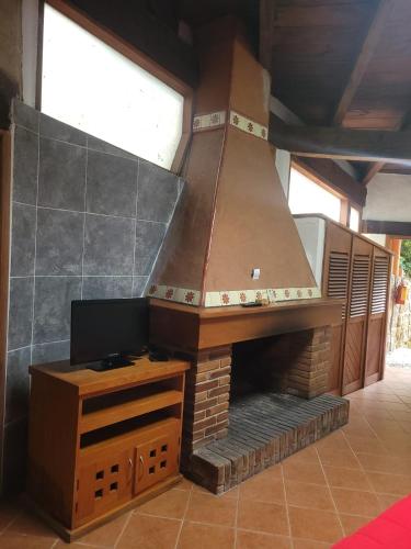 TV a/nebo společenská místnost v ubytování Hotel Casa Valle