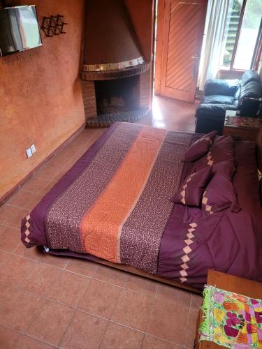 Postel nebo postele na pokoji v ubytování Hotel Casa Valle