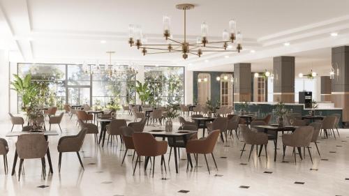 Restoranas ar kita vieta pavalgyti apgyvendinimo įstaigoje Dobedan World Palace Hotel ''Ex Brand Alva Donna World Palace ''