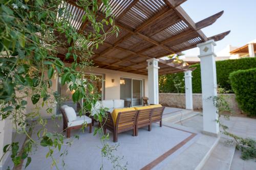 Κήπος έξω από το Stayr Somabay - Bay Life Home Rentals