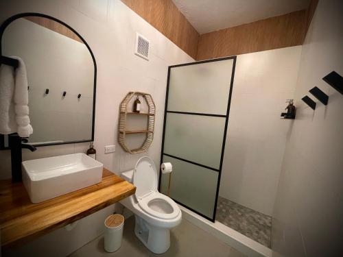 Vannituba majutusasutuses 1 Corcega Beachfront Suites
