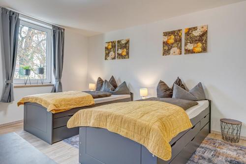 Postel nebo postele na pokoji v ubytování Georgi Apartments