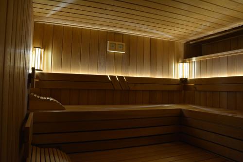 an inside of a sauna with a light on at Boutique Hotel Wolfsburg in Wolfsburg