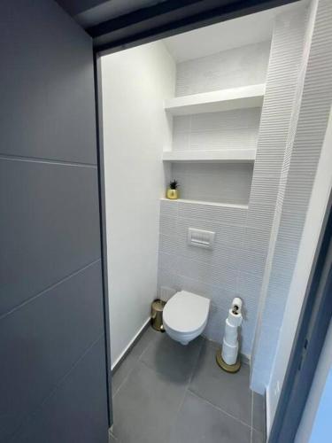 Ein Badezimmer in der Unterkunft L’oasis douceur