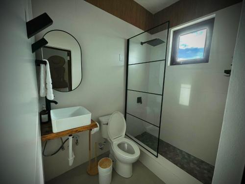 Vannituba majutusasutuses 1 Corcega Beachfront Suites