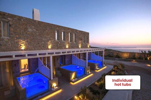 an aerial view of a building with blue lights at Villa Panamera, Private Heaven, Supreme View in Fanari