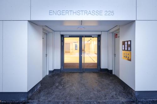 an entrance to an empty building with a door at Zoder Apartments in Vienna