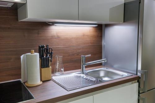 a kitchen with a sink and a counter top at Zoder Apartments in Vienna