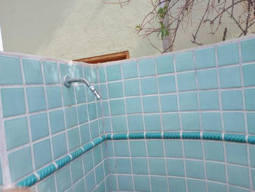 a blue tiled tub with a shower in a bathroom at Casa Pájaros - Private 2-Story Home in Cabo Pulmo