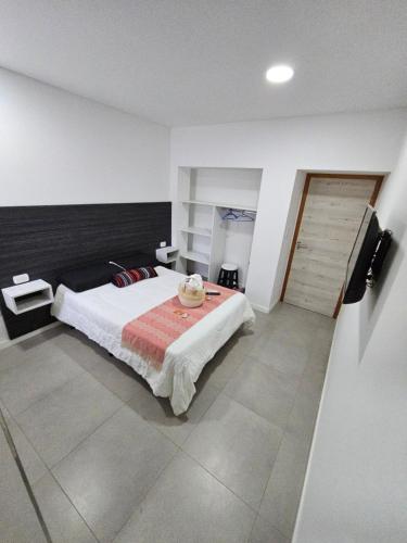 Ένα ή περισσότερα κρεβάτια σε δωμάτιο στο Adriatica Apartamentos