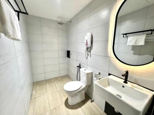 Koupelna v ubytování Urban Inn, Serai Wangi