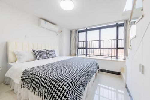 Postel nebo postele na pokoji v ubytování Lavender Apartment Branch