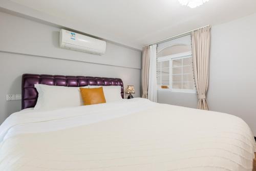 Postel nebo postele na pokoji v ubytování Lavender Apartment Branch