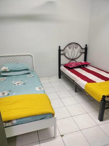 Katil atau katil-katil dalam bilik di Homestay Section 19 (Ahmadhousee) Muslim Friendly
