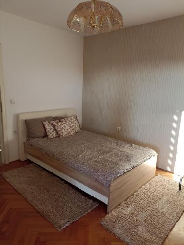 Katil atau katil-katil dalam bilik di ROYAL Apartmani