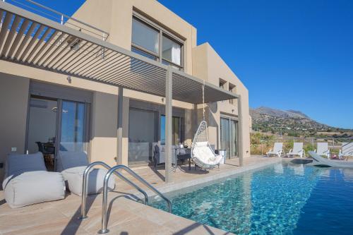 Πισίνα στο ή κοντά στο Olive and Aloe Villas
