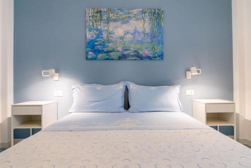 En eller flere senge i et værelse på Il Borgo Luxury Retreat