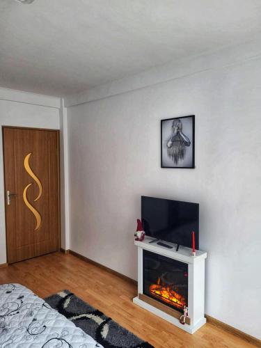 TV in/ali zabaviščno središče v nastanitvi La Simo
