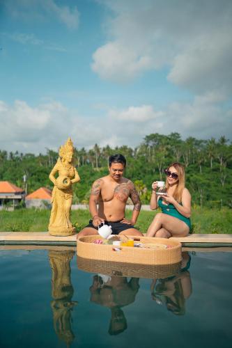 Hosté ubytování The Pyramid Ubud River Villas