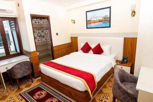 Postel nebo postele na pokoji v ubytování Hotel Palazzo