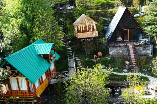 an overhead view of a model house and a play set at Himalayan Abode Tree House in Sainj