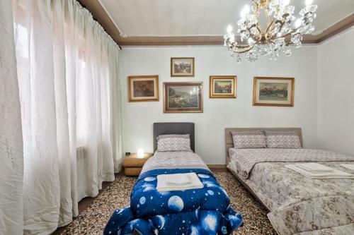 Postel nebo postele na pokoji v ubytování Santa Marina Venice Apartment