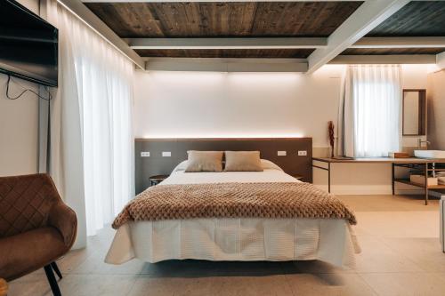 Letto o letti in una camera di Casa Pelegrí