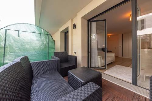 Ένα μπάνιο στο Chic T2 with Jacuzzi near Paris