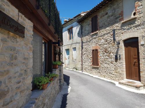 an empty street in an old stone building at IL BORGHETTO in San Sisto