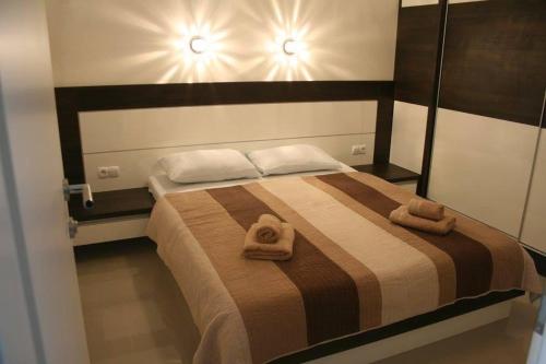 Katil atau katil-katil dalam bilik di Guesthouse Villa Plitvička
